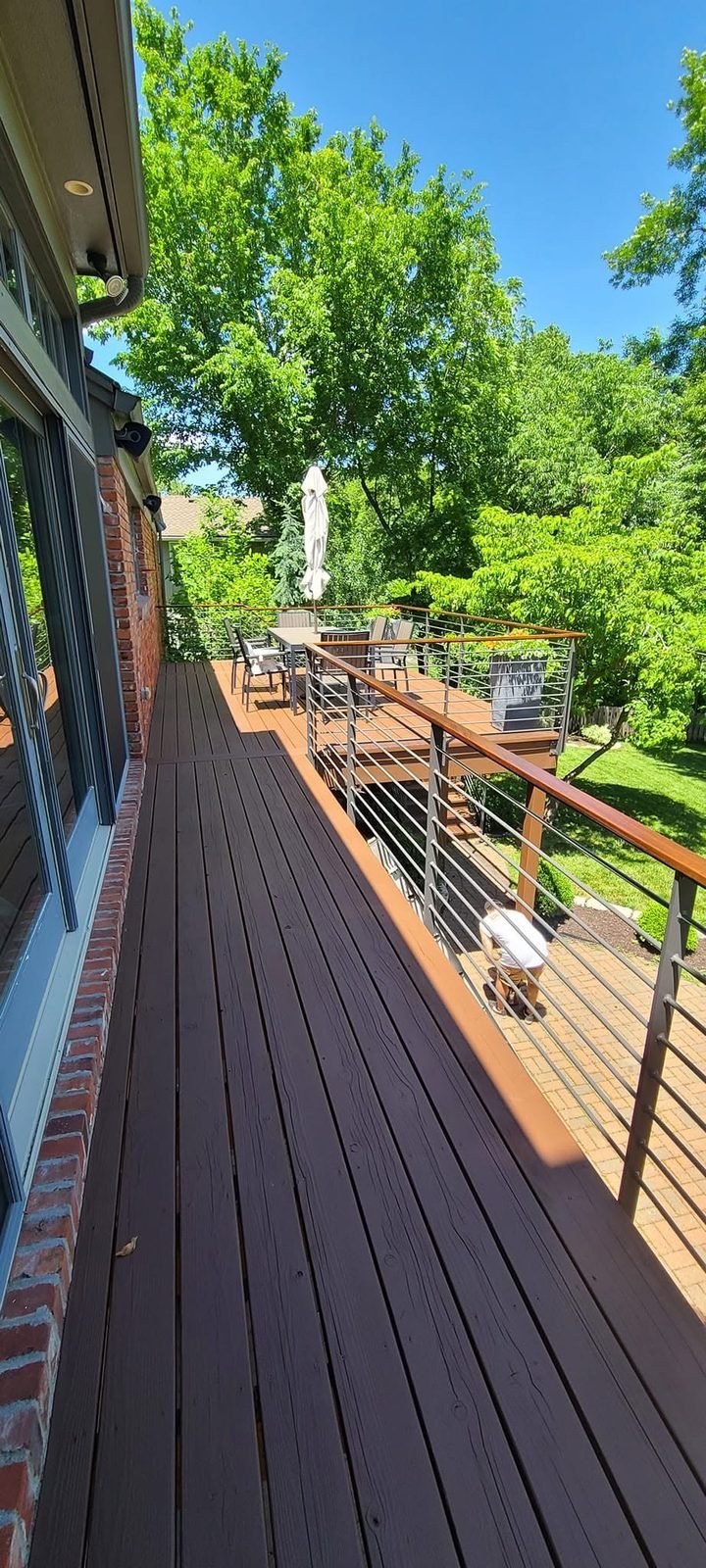 Long deck after staining, rich color restored