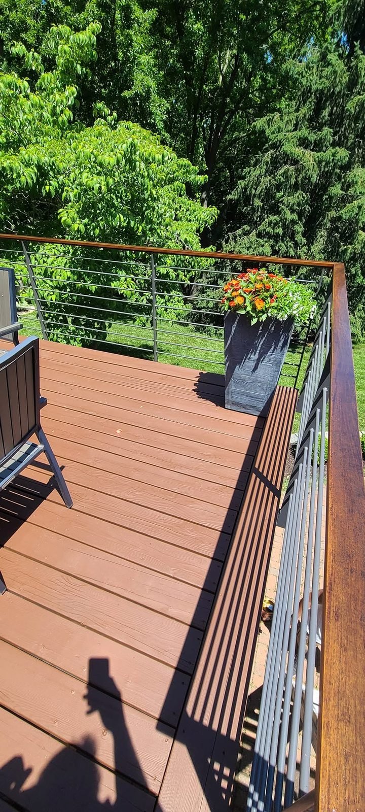 Deck corner with planter after restoration