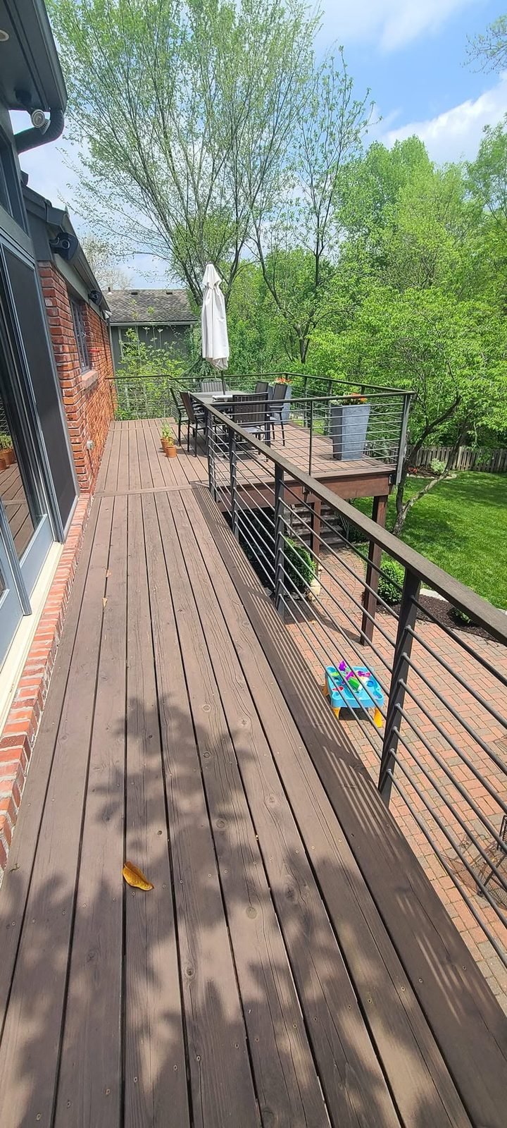 Deck boards faded and worn before restoration