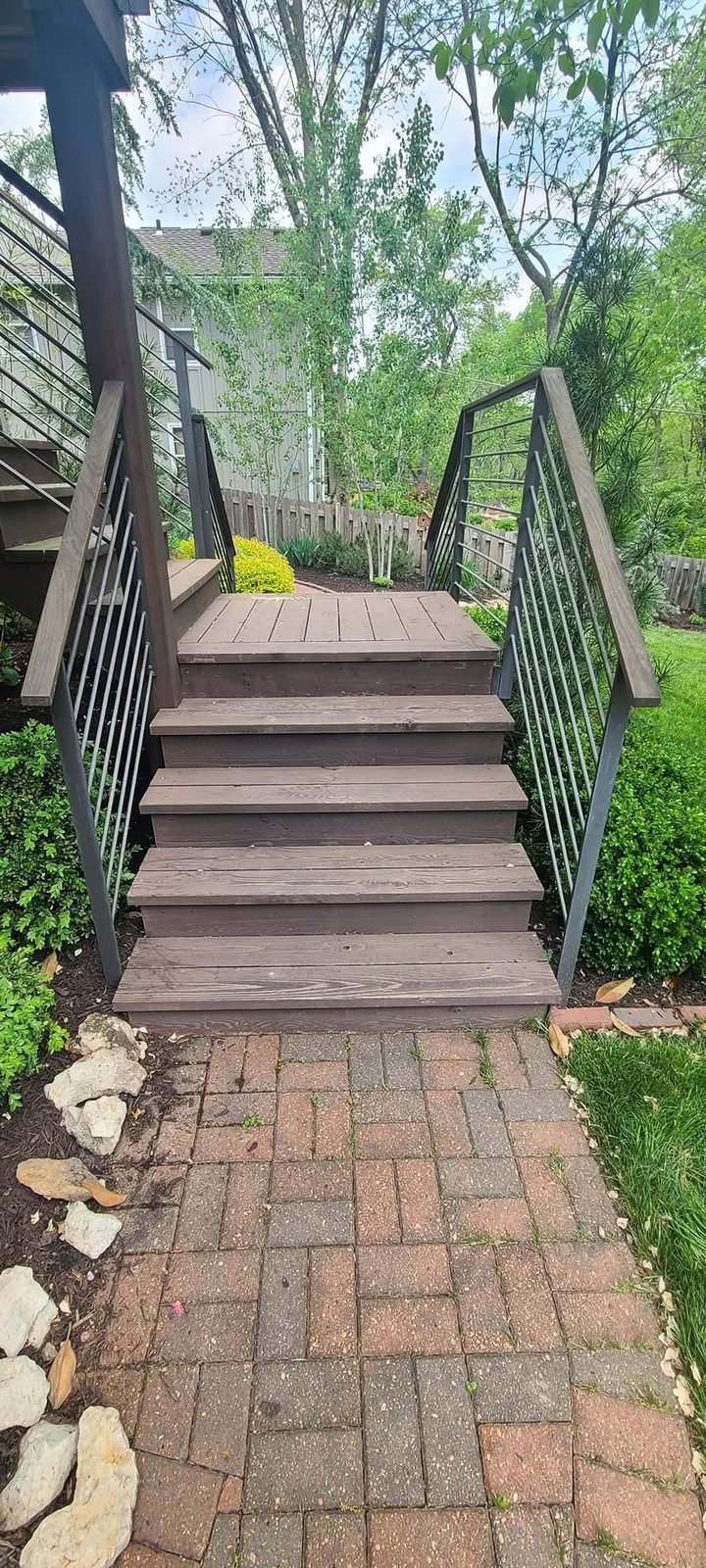 Weathered deck stairs before refinishing