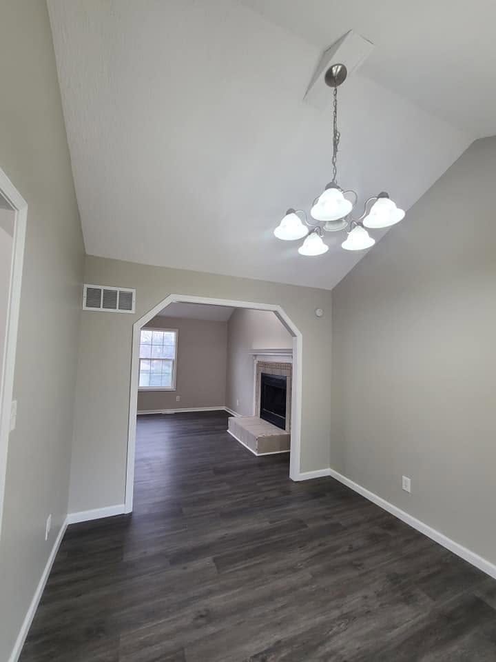 Dining room with archway to the fireplace