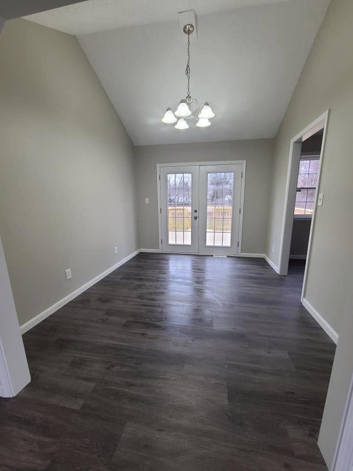Dining room with french doors and new flooring
