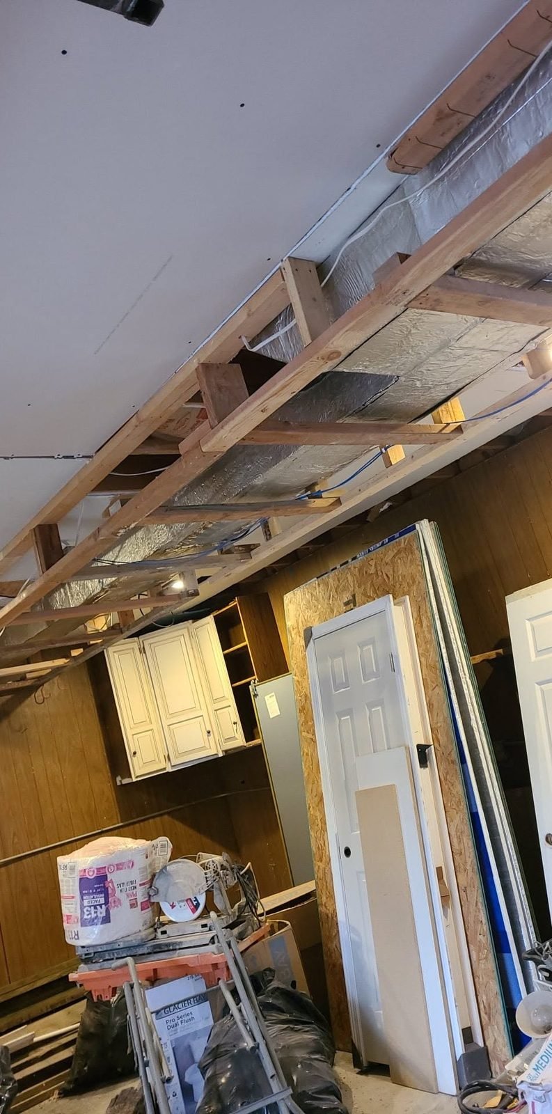 Ceilings opened up for new framing