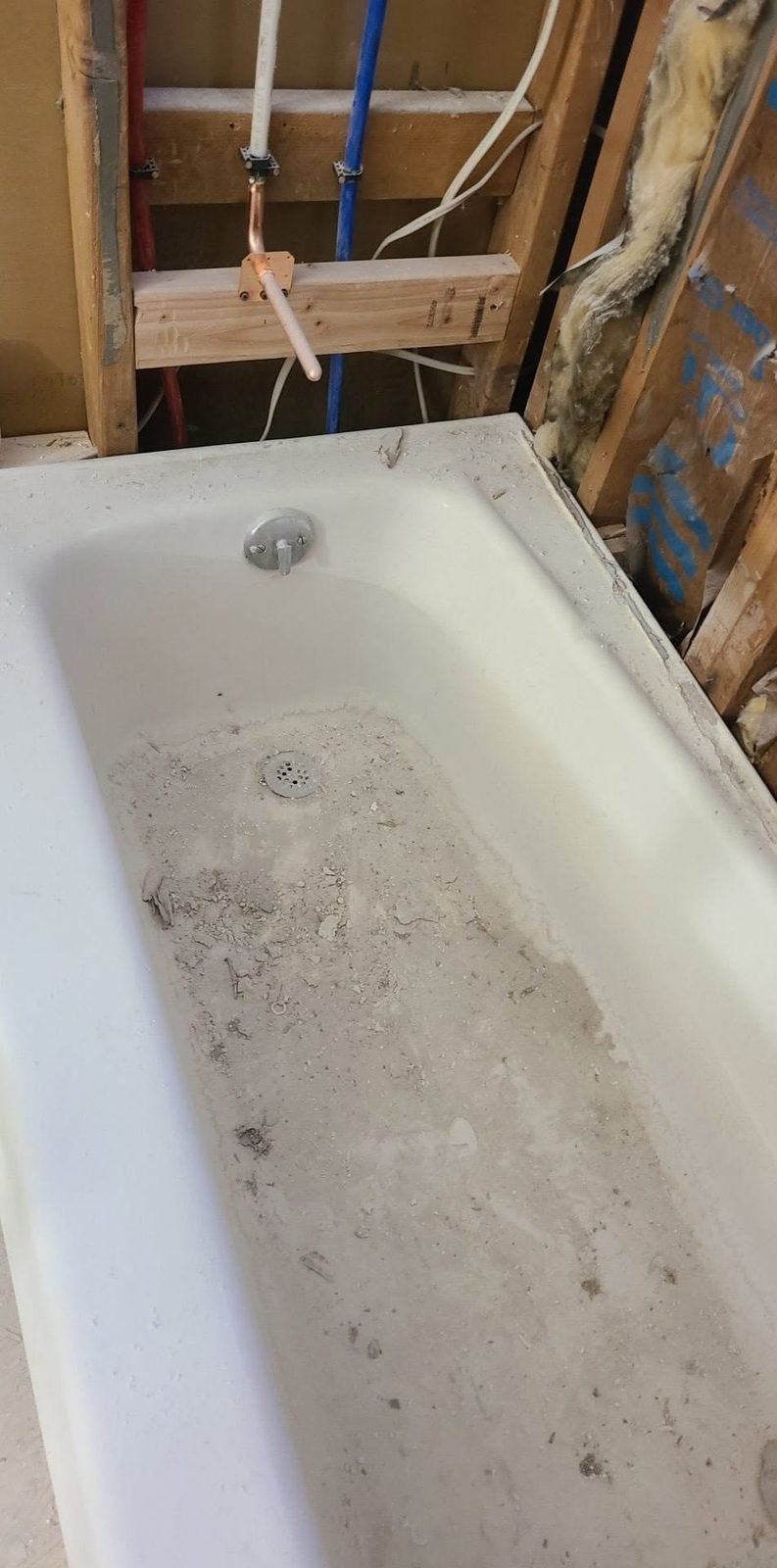 Old tub removed during bathroom demo