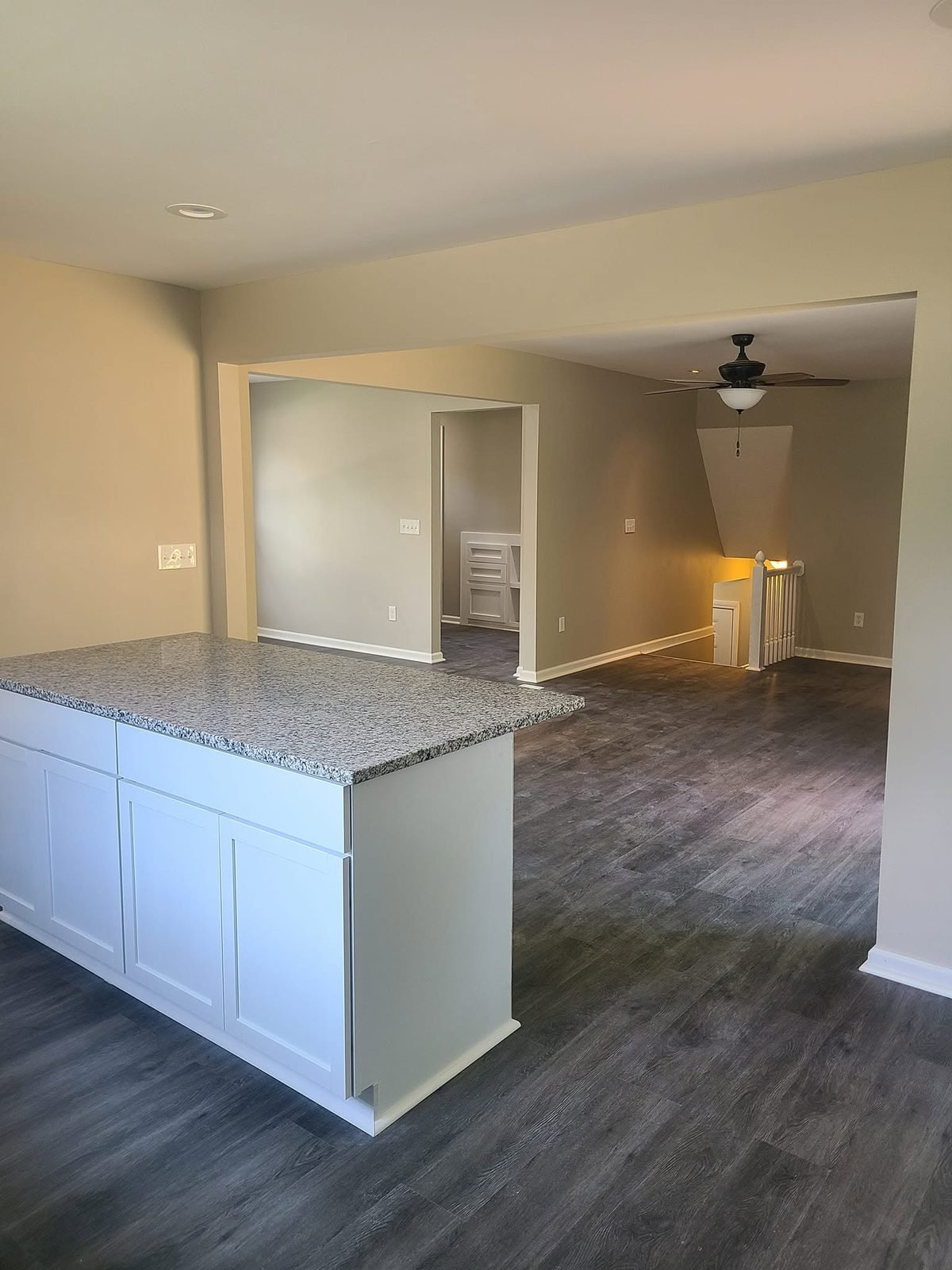 Kitchen island opening to the living area