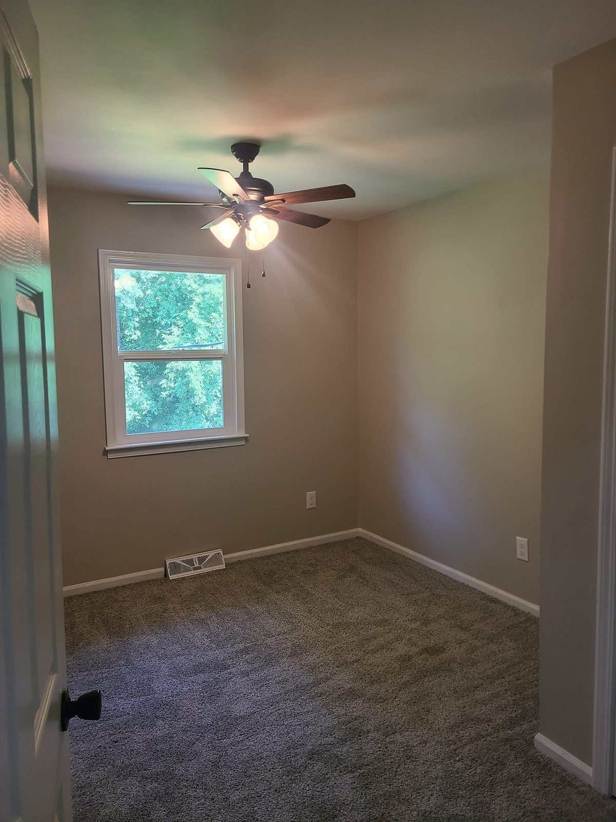Bedroom with fresh paint and new carpet
