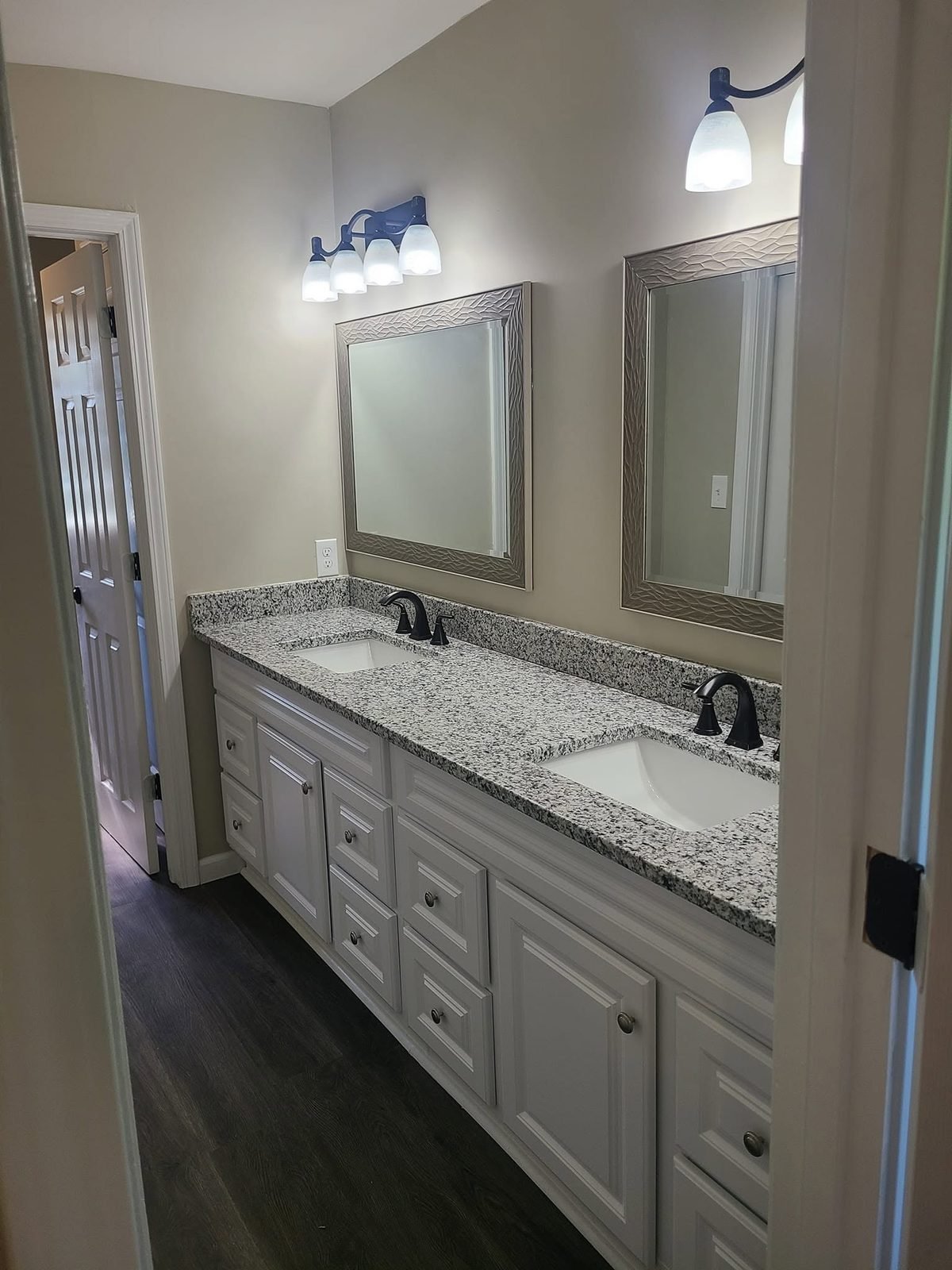 Bathroom with double granite vanity